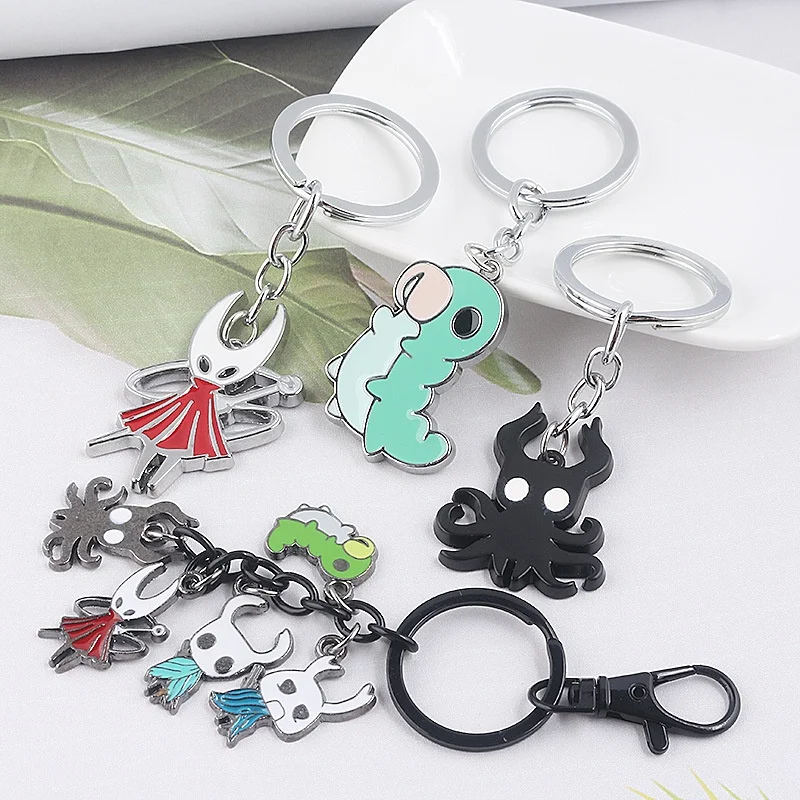 

New Anime Merchandise Hollow Knight Bone Nail Logo Keychains The Pale King Figure Key Chain Jewelry Toy Gift Keyring Trinket ﻿