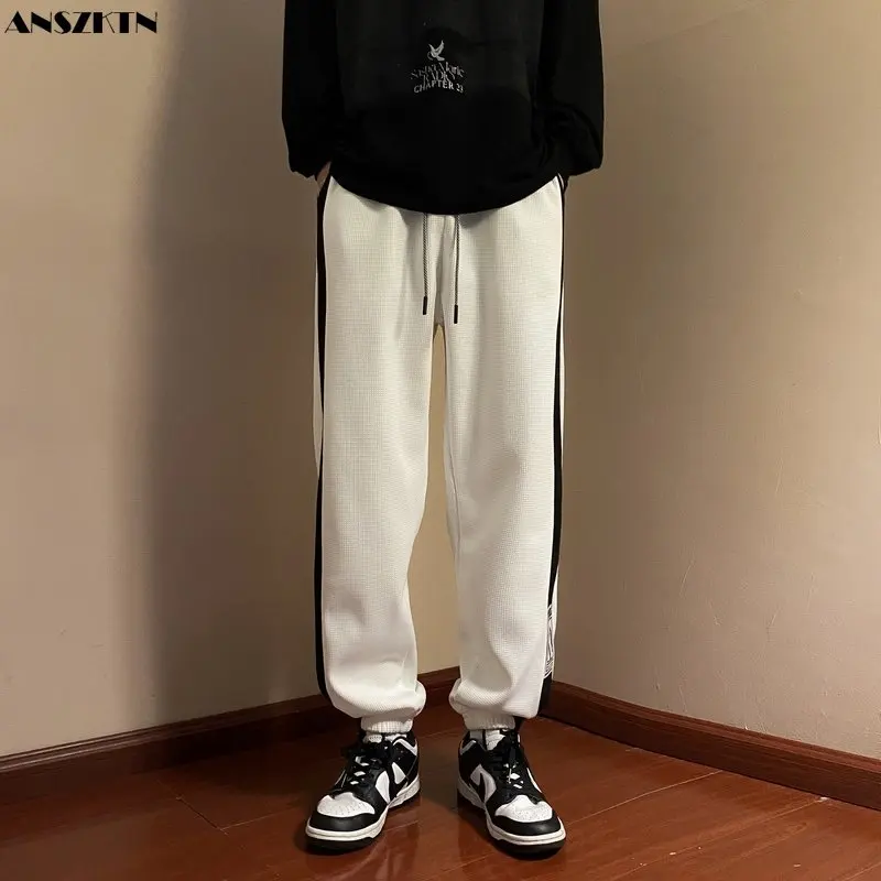 

ANSZKTN Waffle men's trend leisure spring and autumn bundle foot hanging sense wide leg long style sweatpants