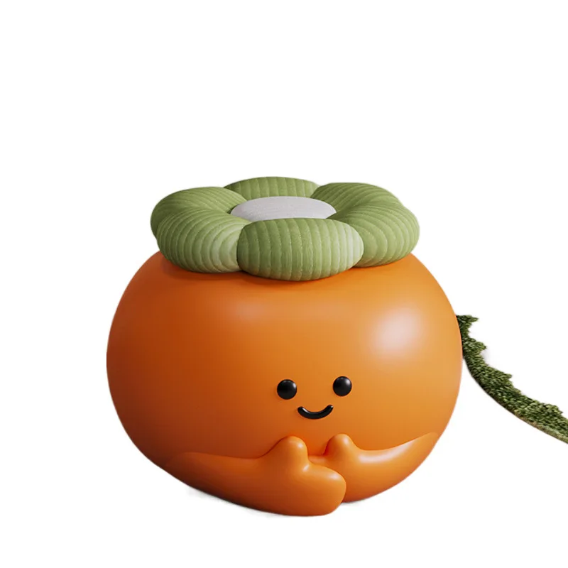 

Creative cute persimmon shoe changing stool, floor-to-ceiling decorations next to the sofa in the