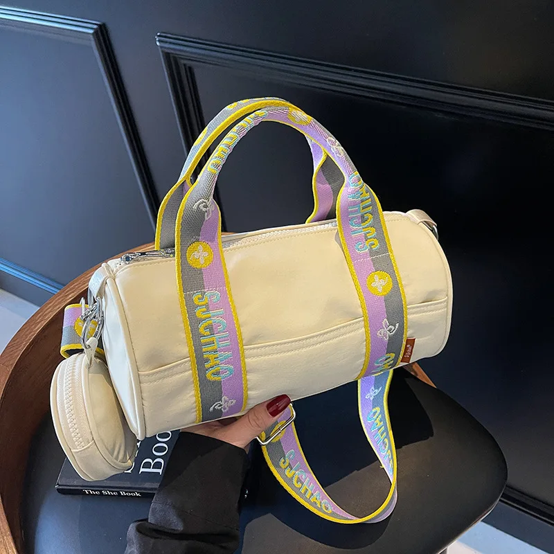 

Новинка 2025, нейлоновая сумка-бочка для женщин, круглая сумка через плечо, легкая спортивная сумка, универсальная и водонепроницаемая ​