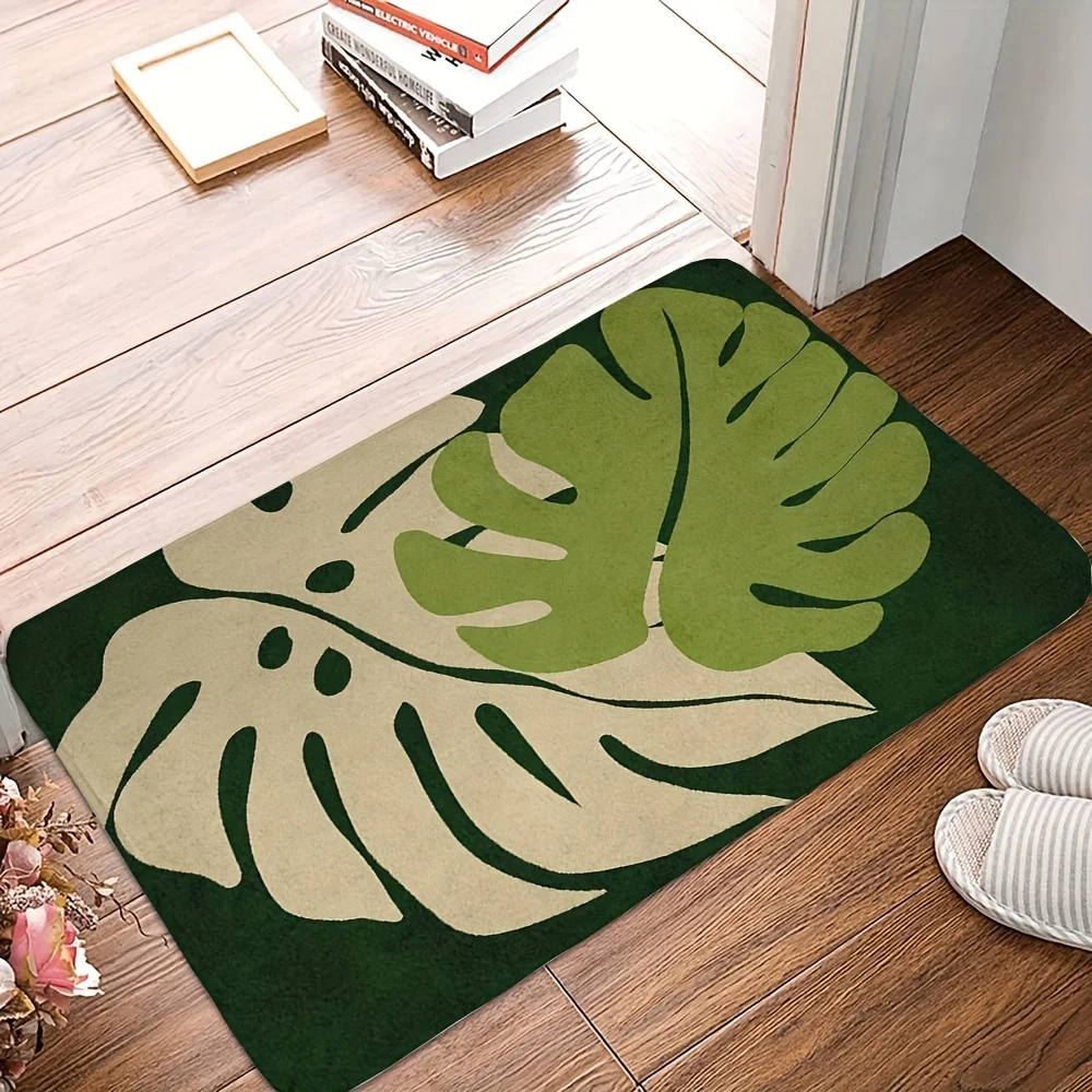 

Tropical Monstera Leaf Pattern Doormat, made of polyester fabric, machine washable, suitable for bedrooms and living rooms.