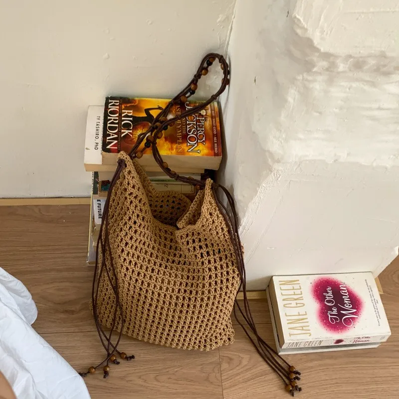 handwoven-summer-large-capacity-shoulder-bag-hollow-out-commuter-beach-casual-style-pu-leather-simple-design-empty-beach-bag