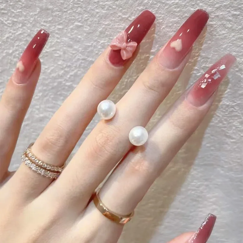 24個入り レッドグラデーションボウプレスオンネイル ハートプリント マニキュア装着可能ネイル 女性と女の子用 付け爪