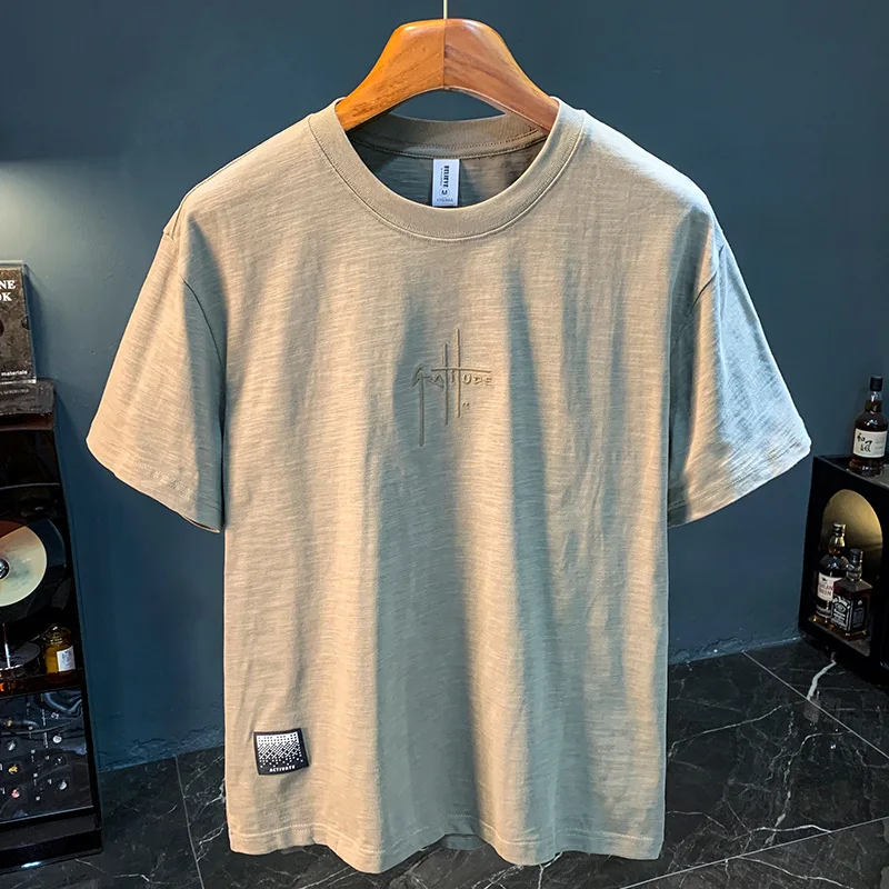 T-shirt men's 2025 summer new fashion simple round neck breathable loose short sleeved comfortable
