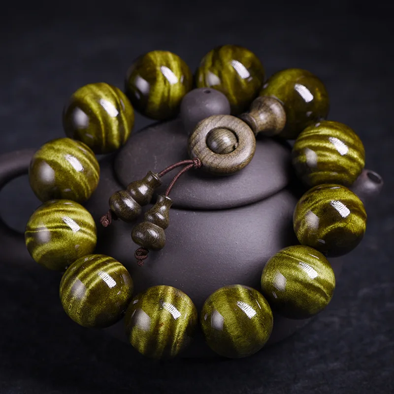 Large-leaf golden nanmu natural water ripple dragon bone pattern Buddhist prayer beads bracelet for men and women,