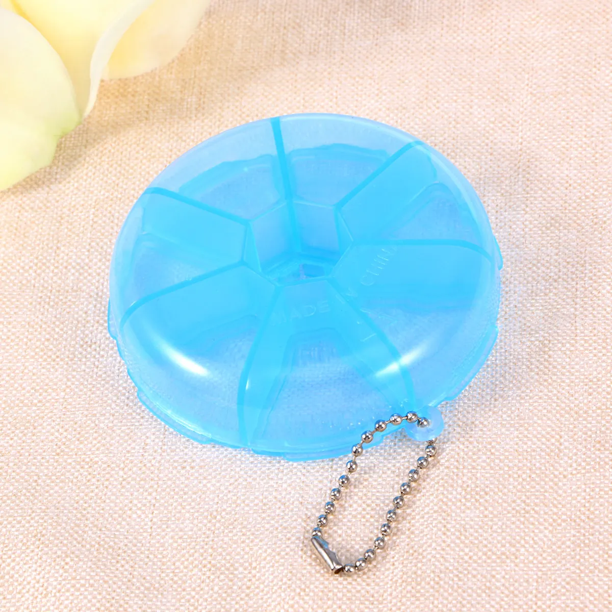 Round 7-Day Pill Box Organizer Weekly Medicine Dispenser with 7 Compartments for Travel Home Office Senior Daily Use Blue