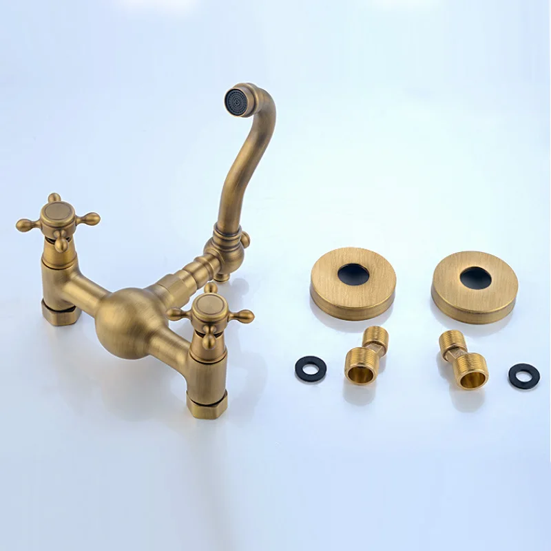 Antique Brass Wall Mounted Bathroom Sink Faucet 360° Rotating Double Handle Hot Cold Mixer Tap