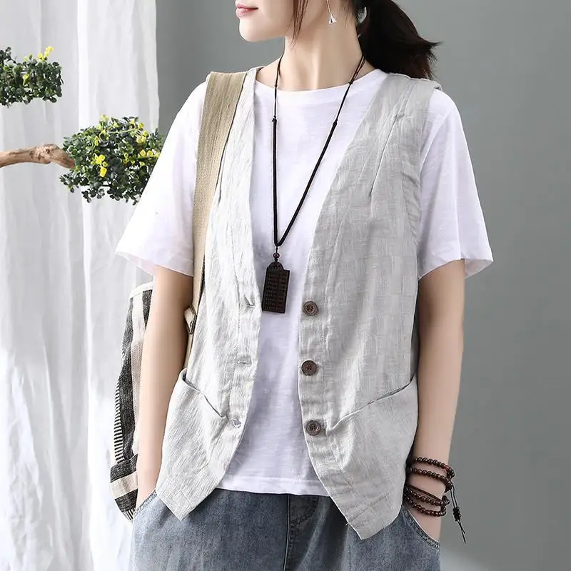 Minimalist Commuter Vests 2024 Summer New Women's V-Neck Button Spliced Pockets Fashion Loose All-match Sleeveless Casual Coats