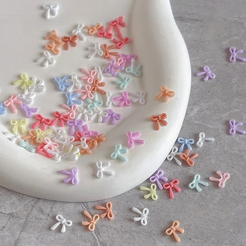 

Resin Thin Bow Tie Small Bowknot Sweet Colorful Ribbon Charms Nail Art Decorations Manicure Tool Accessories Wholesale Supplies