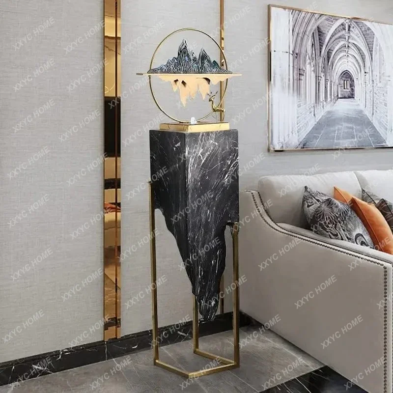 A  Next to the household TV cabinet, flowing water ornament, rockery, light luxury fountain, landing good things, landing home