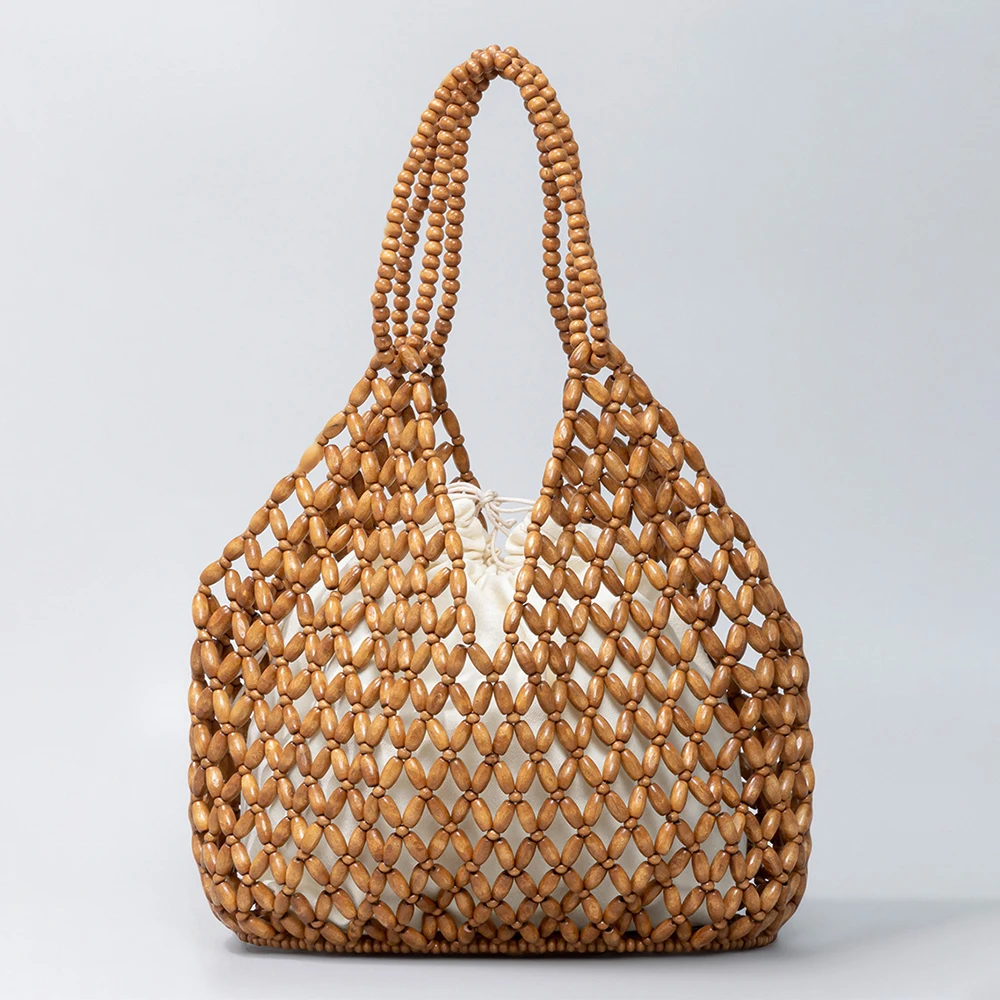 

Women's summer beach vacation large capacity shoulder bag fashion hand woven bag casual bead shoulder bag casual travel handbag