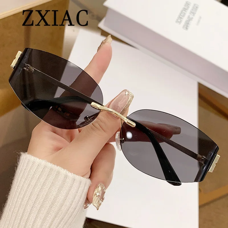 ZXAIC Fashion Frameless Oval Sunglasses Women Curved lenses rimless trim Sun Glasses Brand Designer Men Metal thin leg Shades UV