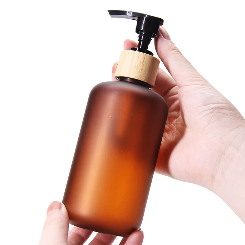 

120ML 250ML 500ML Boston Round Empty Plastic Lotion Bottles for Hair Care Oil Amber Cosmetic Bottle with Bamboo Pump Cap