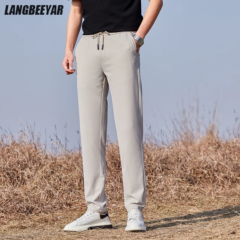 

Top Quality New Brand Casual Fashion Elastic Strappy Sweatpants Relax Fit Track Pants Straight Trousers Mens Clothes 2025