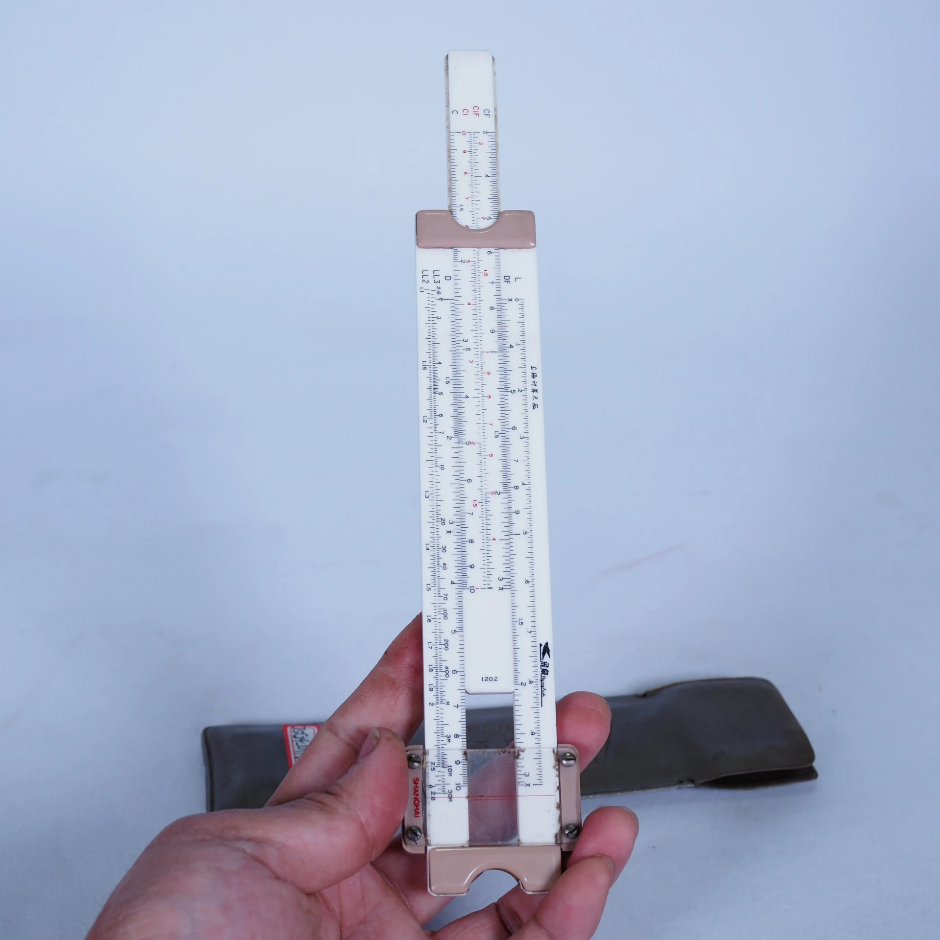 الحنين الأشياء القديمة قاعدة الشريحة اللوغاريتمية 196070s الأشياء القديمة الفولكلور حلية آلة حاسبة