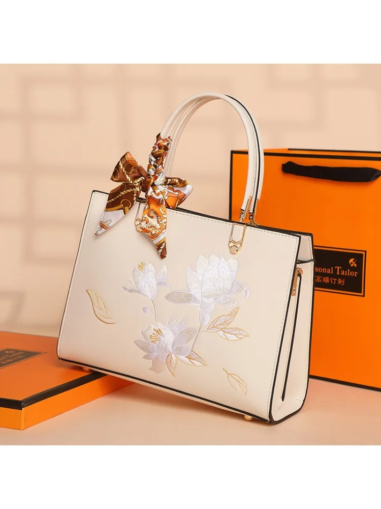 

2025 Hot sale embroidery, red bag gift handheld, messenger women's bag