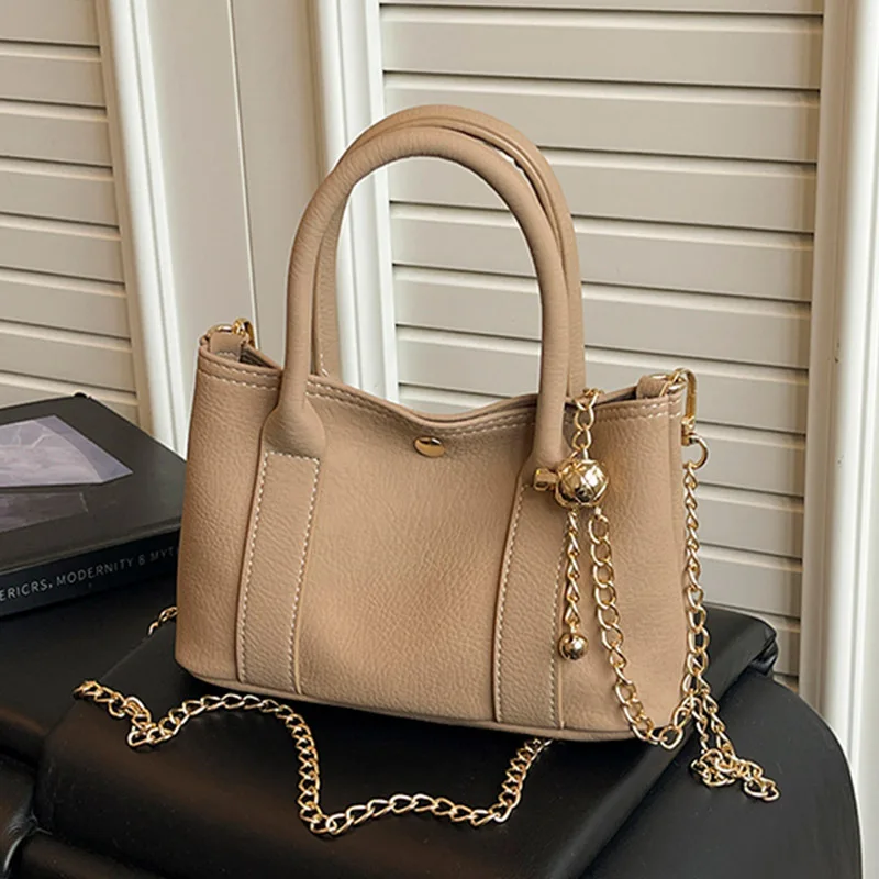

Korean Style Simple Casual Commuter Handbag 2026 Hot Sale Solid Color PU Handbags Versatile Design Sense New Niche Bucket Bag