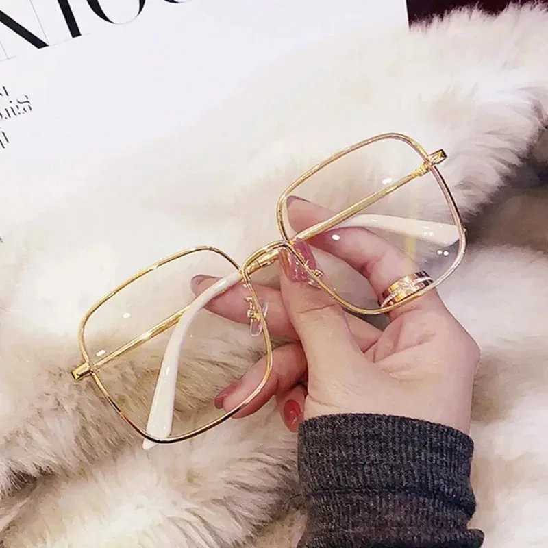 Women's unisex anti-blue light radiation computer glasses with transparent square metal frame and optical protection  Glasses