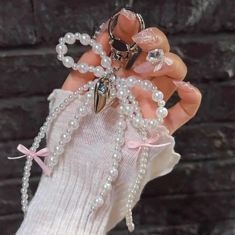 Y2K INS اللؤلؤ Bowknot المفاتيح النساء اللؤلؤ شرابات الوردي الشريط الحلو معلقة Keyrings ظهره حلقة رئيسية اليدوية مجوهرات هدايا