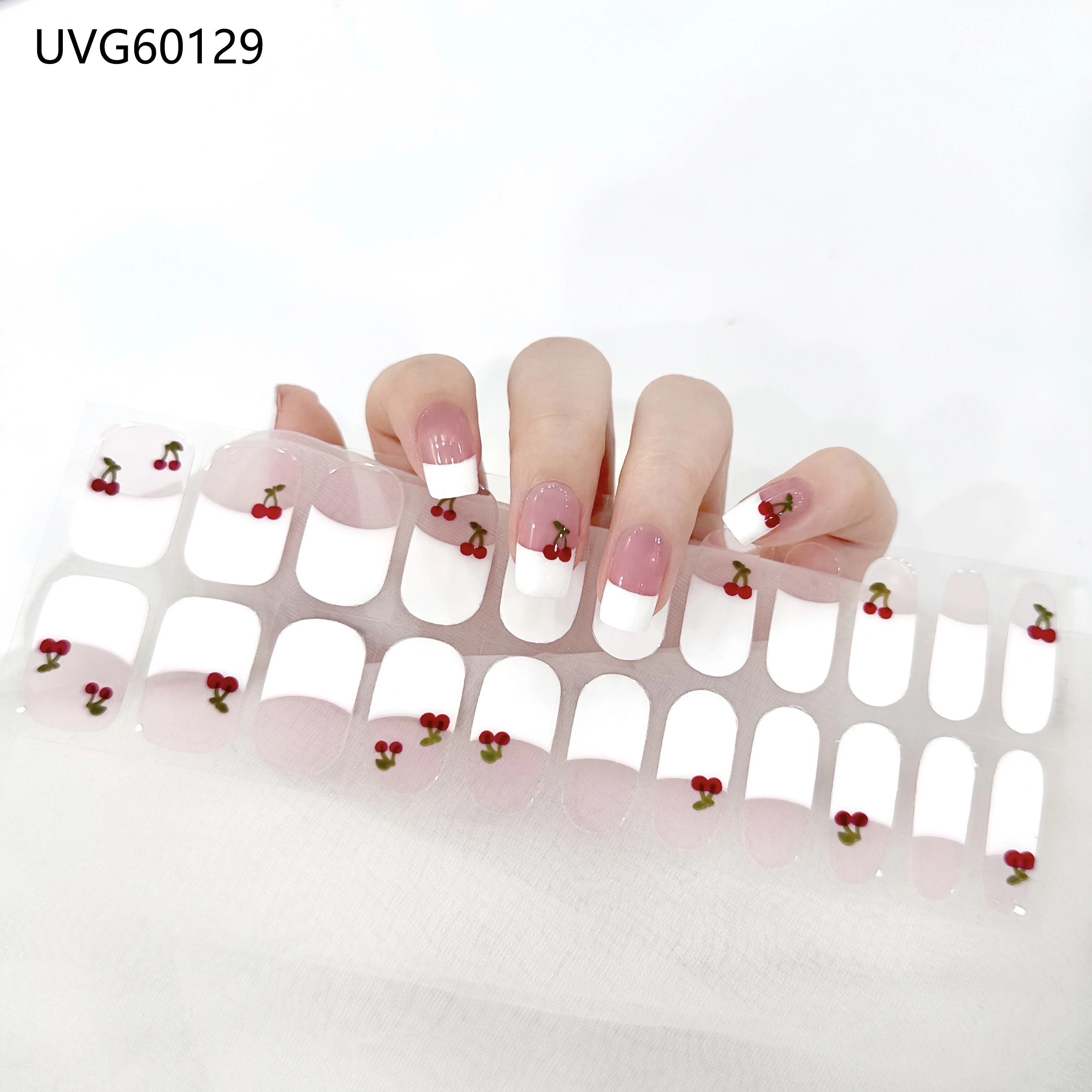 

Гелевые полоски для ногтей в стиле Coquette: белые французские маникюры с вишнями, милым дизайном красных фруктов и бантиков, для создания нежного девичьего образа.