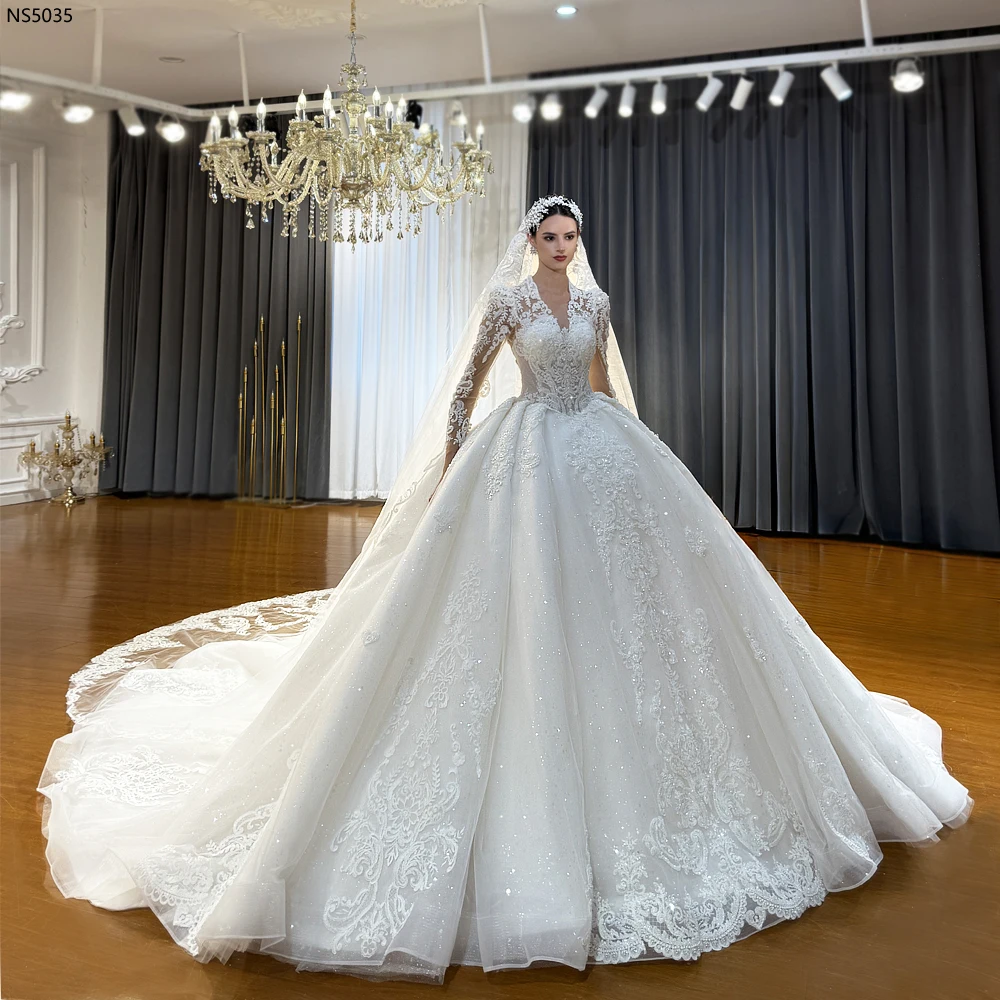 فستان زفاف دانتيل NS5035 Amanda Novias مخصص 2026 عرض ساخن بأكمام طويلة #1