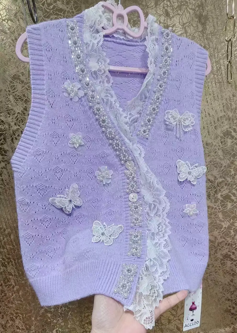 فاخر فريد تصميم المرأة تريكو سترة سترة صوف من دون أكمام اتجاهات 2025 الخريف محبوك ملابس امرأة