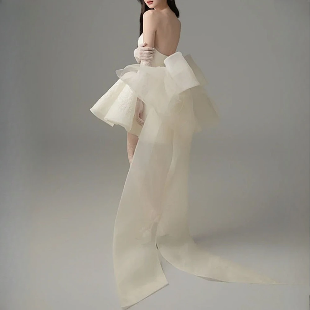 TWOTWINSTYLE solide épissé maille nœud papillon robes douces pour les femmes sans bretelles sans manches taille haute élégant Mini robe femme nouveau