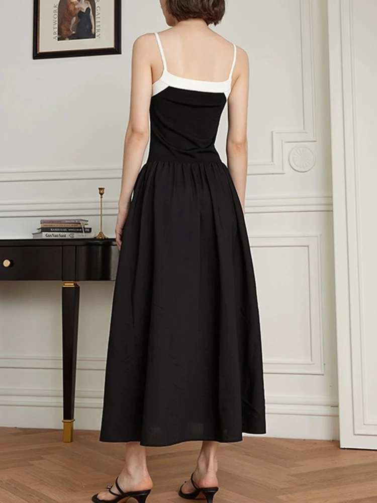 レトロなコントラストのセクシーなサスペンダー A ライン スカート ハイウエストとスリムな木製耳が付いた夏の女性の新しいエレガントでファッショナブルなドレス。