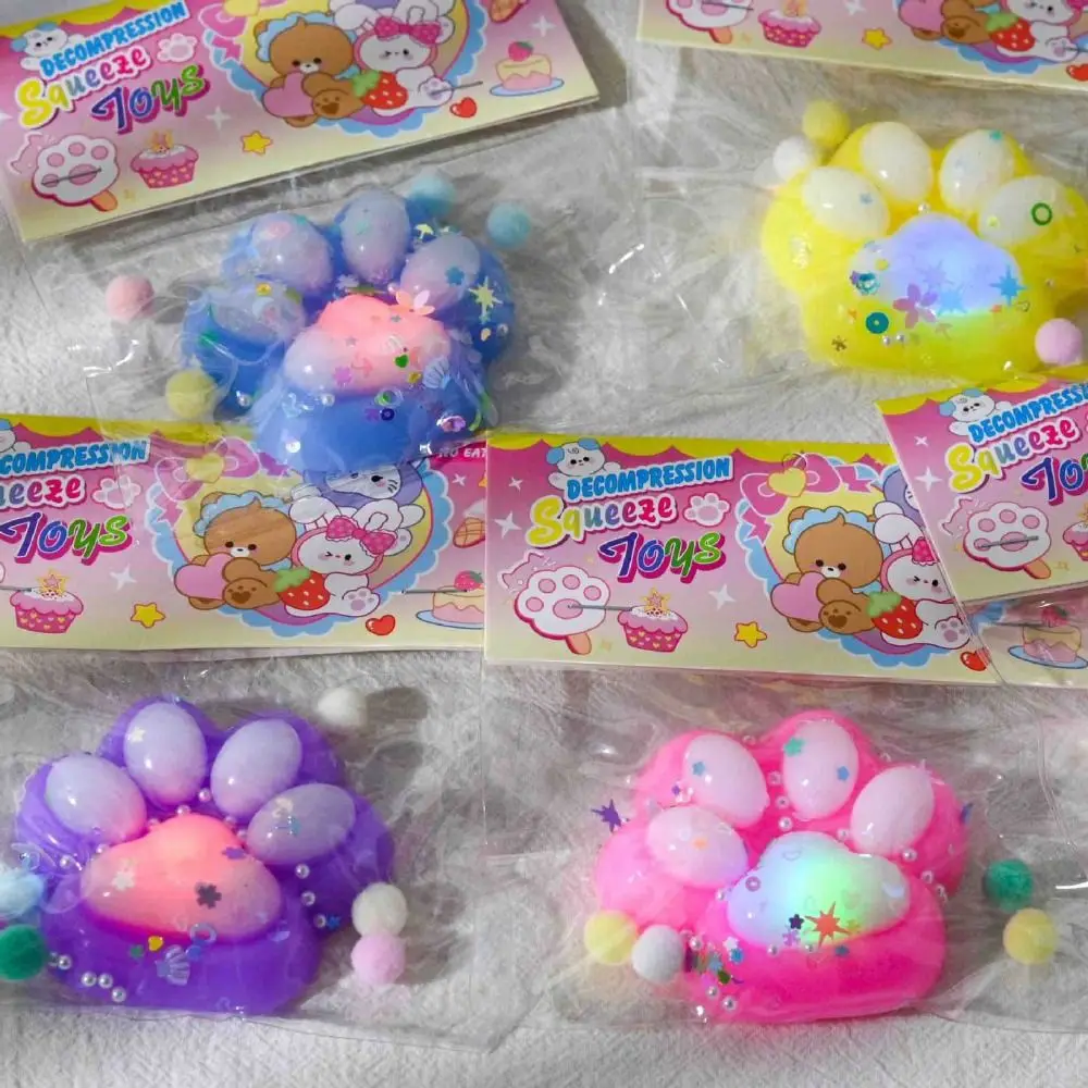 Juguetes para apretar con forma de Pata de Gato brillante Kawaii, juguete de descompresión de pellizco de rebote lento TPR suave y bonito para niños, regalo de Año Nuevo