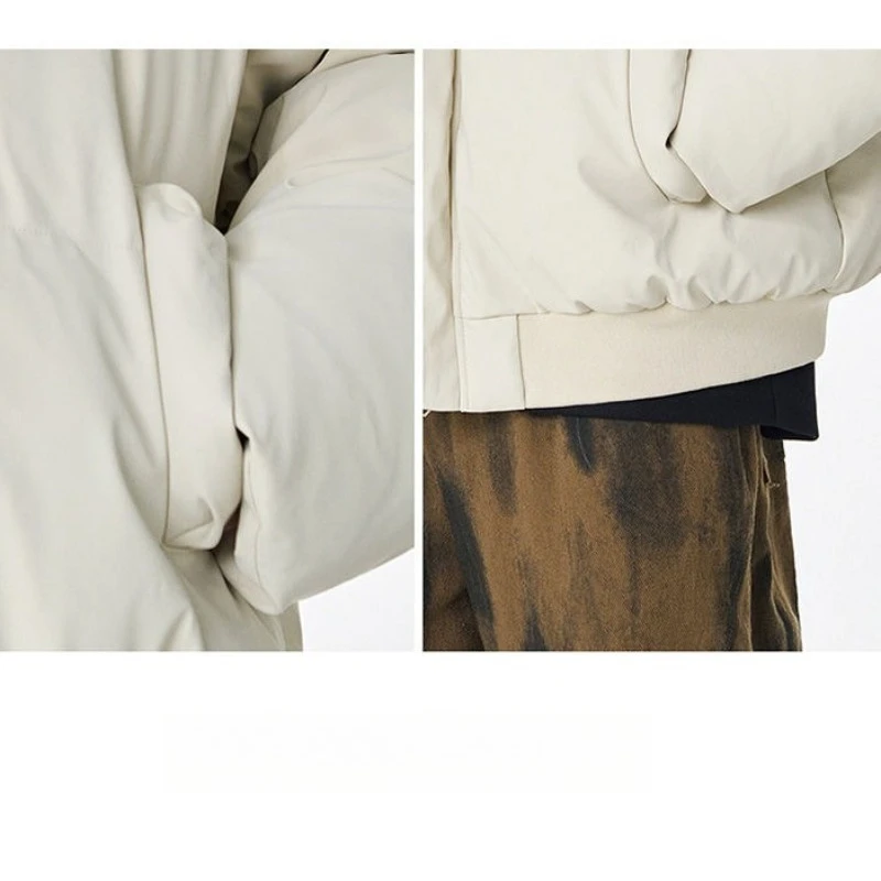 2025 Abrigo de algodón de color sólido corto y grueso cálido de invierno para hombre, chaqueta holgada informal a prueba de viento con cuello levantado.