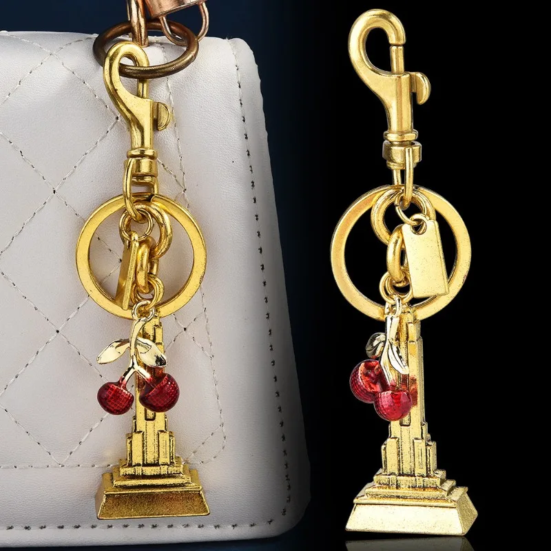 Nuova borsa portachiavi con torre da costruzione di fiori di ciliegio, ciondolo alla moda, ciondolo borsa accessorio portachiavi