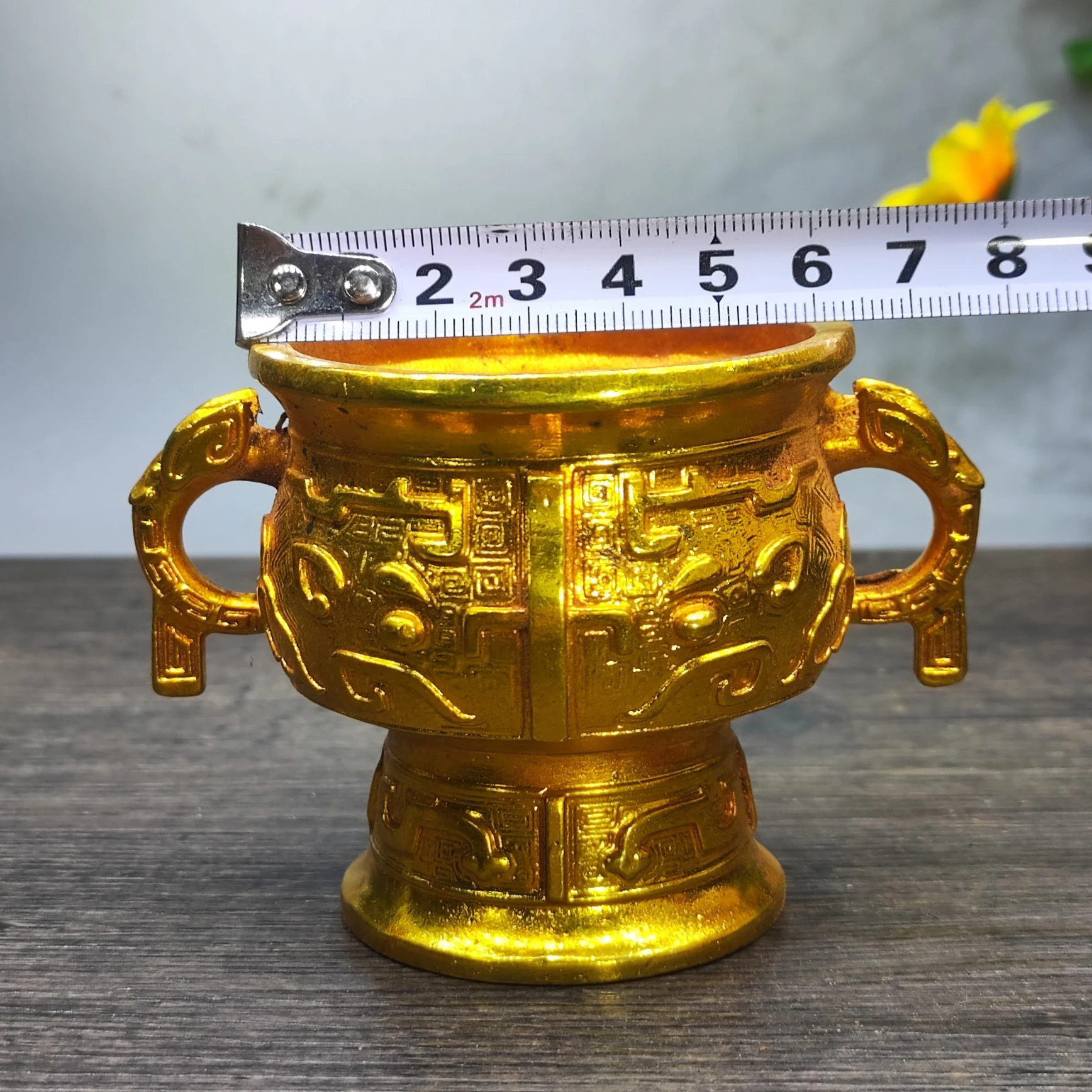 

Family brass gilding Rare Shang Zhou Human Face Beast Ding Binaural Wine Cup Teapot Solid Ornament christmas decoration