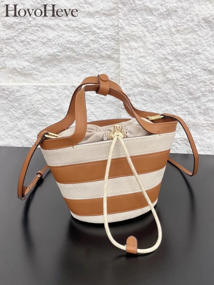 

New Designer Women Mixed Colors Stripe Cowhide patchwork Canvas Woven Bucket Bag Casual Fashion Ladies Shoulder Crossbody Bag
