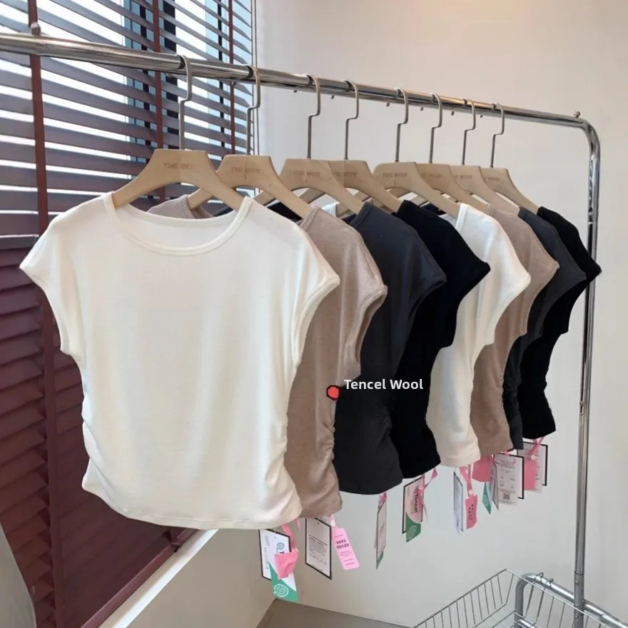 

Женская повседневная модная футболка с коротким рукавом-крылышком, присборенными плечами и эффектом похудения, из полиэстера.