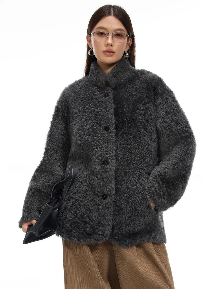 Giacche in shearling di pelliccia di agnello di lusso di fascia alta per le donne 2025 Nuovo semplice cappotto in peluche di pelliccia vera pelle a doppia faccia