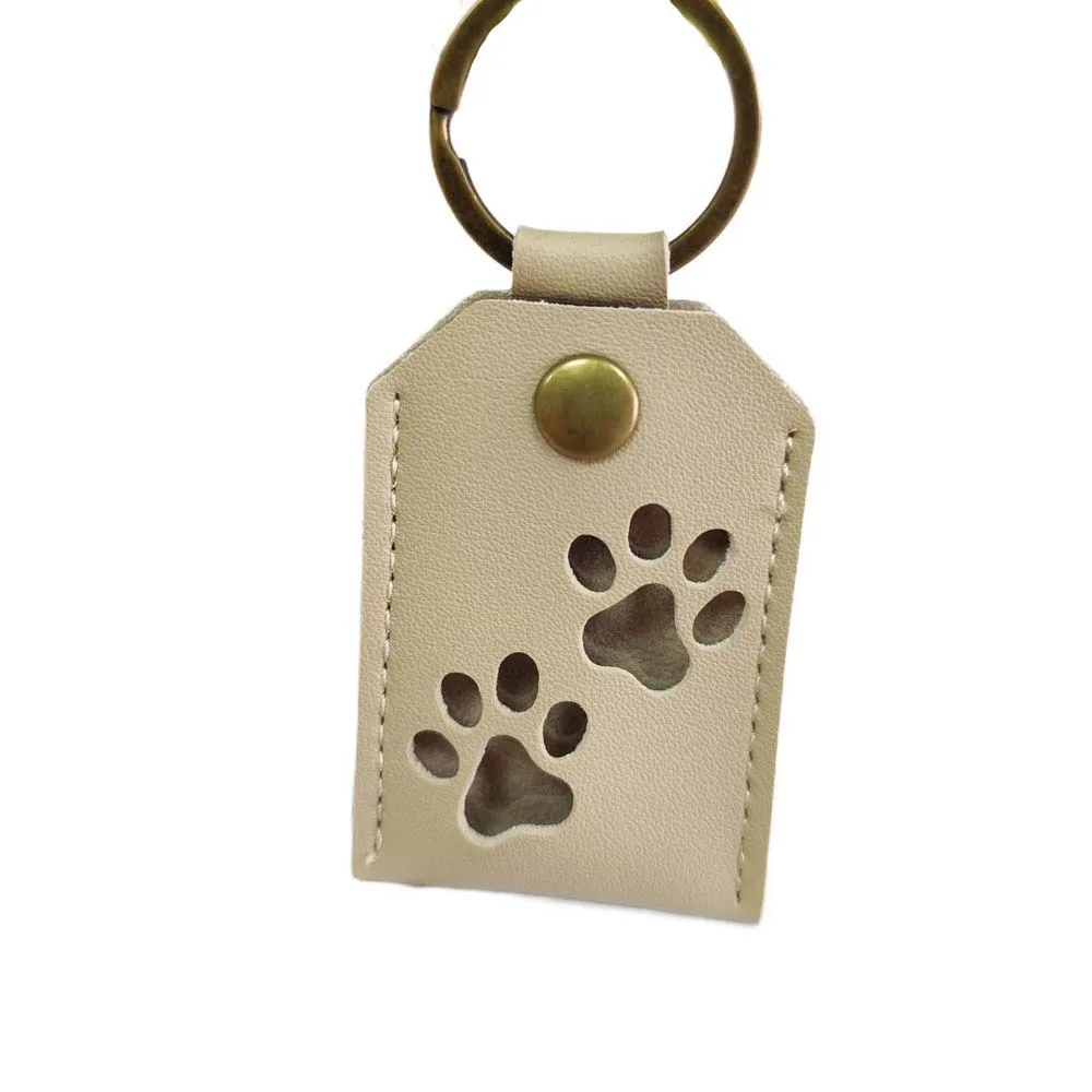 

Cat Dog Claw Pet Hair Storage Bag Puppy PU Leather Pet Hair Keychain DIY Handmade Keyring Dogs Paw Pendant Pet Lovers