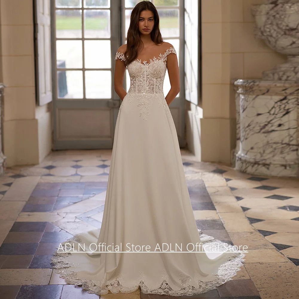 Unique Wedding Dress Vestido Noiva Customized Sheer Scoop Cap Sleeve Sequined Applique Sweep Train A Line Bridal Gown