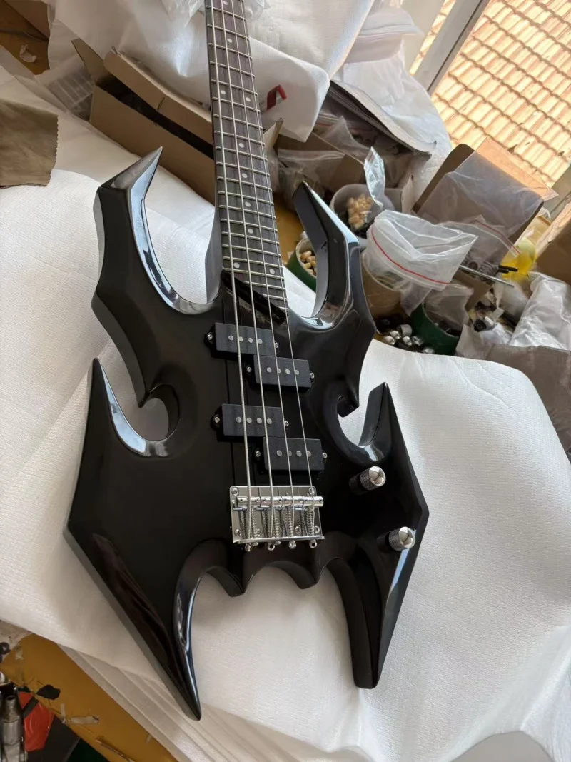 All-black 4-string spider-shaped bass, rosewood fingerboard, silver hardware, solid wood quality, free delivery
