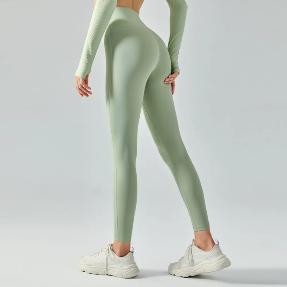 ハイウエストリフティングヒップヌードヨガパンツ女性用高弾性タイト薄型速乾性フィットネスエクササイズクロップドパンツ