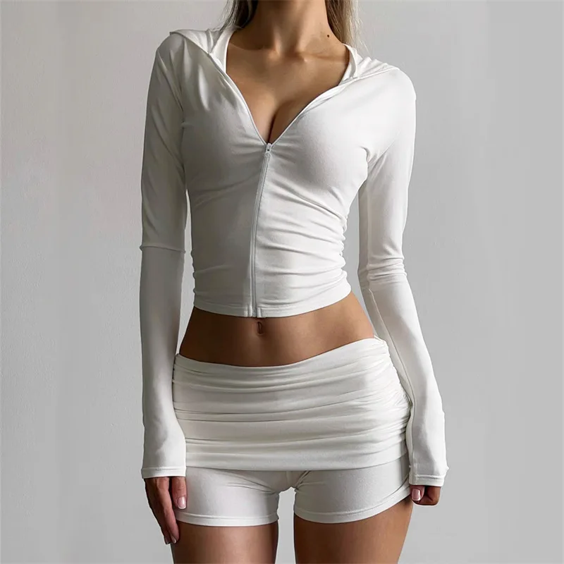 Europäischer und amerikanischer Stil Damen Herbst neuer Reißverschluss Kapuzenoberteil plissierte enge Shorts Mode Sportstil zweiteiliger Anzug