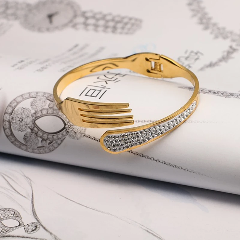 2025 Nueva pulsera brazaletes de acero inoxidable personalizados color dorado joyería original artística como tenedor