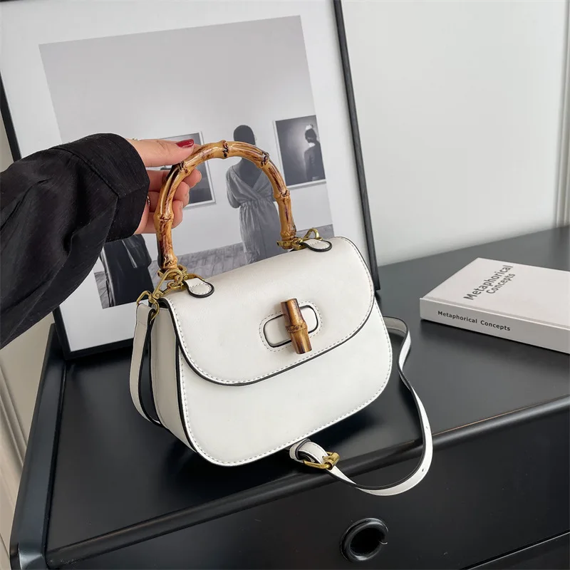 

Autumn/winter new handbag bamboo node bag for women; single shoulder bag; small group design; light luxury; vintage saddle bag.