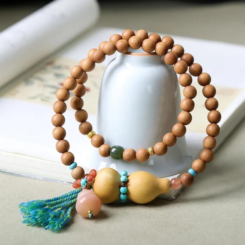 Original Barbie sandalwood bracelet with gourd beads featuring multiple layers and a Chinese-style design