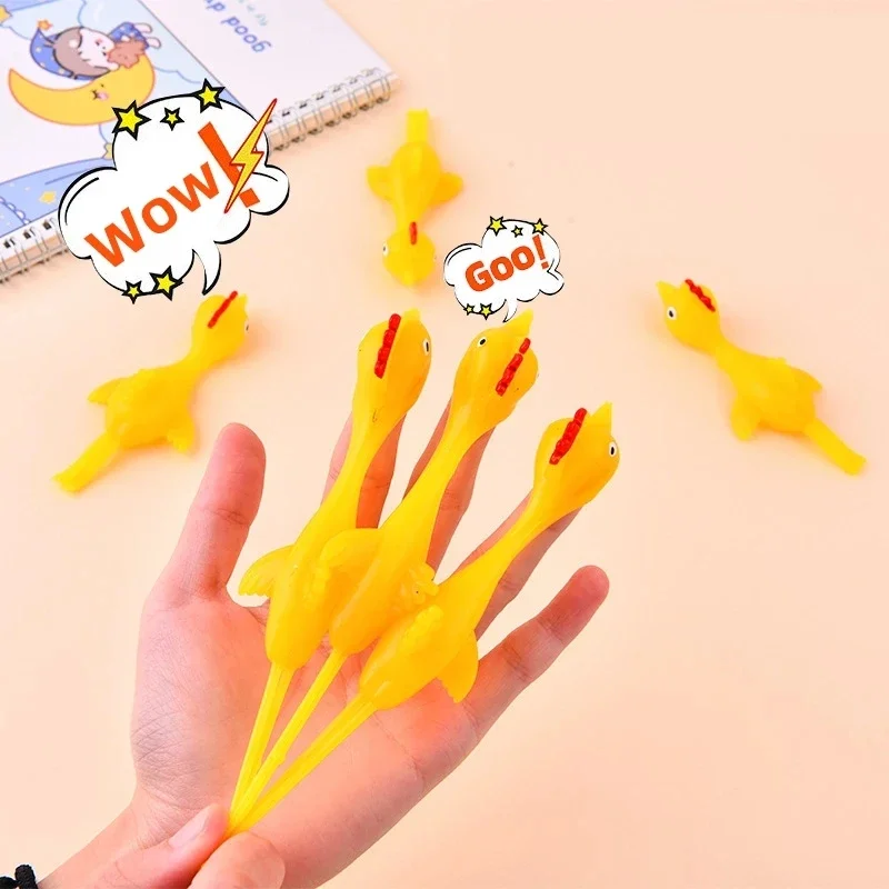 50-5pcs Novelty Catapulted Ejection Chicken Toy Light Rubber Finger Prank Flying Toy Slingshot Chicken Finger Toys Turkey Sticky