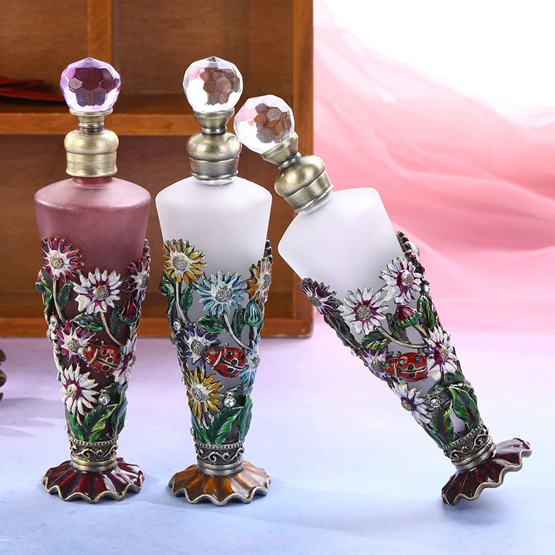 New 25ml conical bottle enamelled chrysanthemum empty perfume bottle beautifully embossed with a three-dimensional floral patter