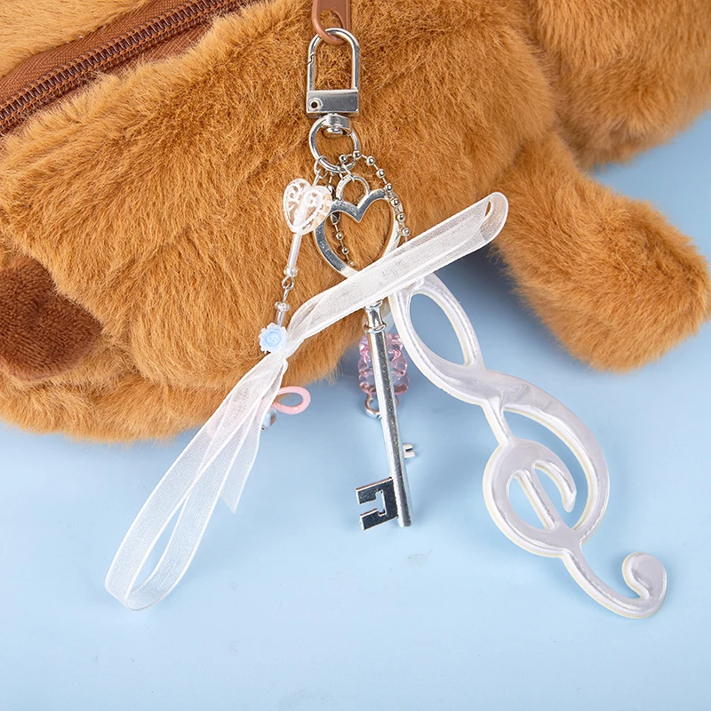

Creative Resin Bow Note Bag Charm Key Chain Personalised Key Backpack Jewellery Suitable For Music Lovers And Audiophiles Gifts