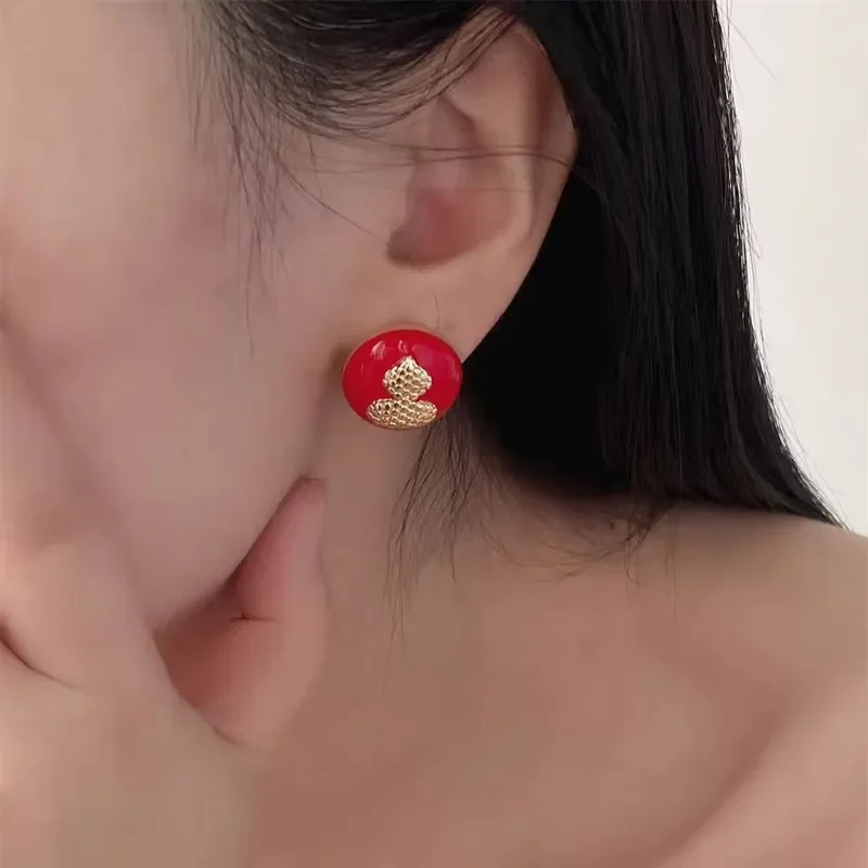 Retro black gold enamel gourd stud earrings New Chinese simple versatile stud earrings Femininity advanced unicorn gourd stud