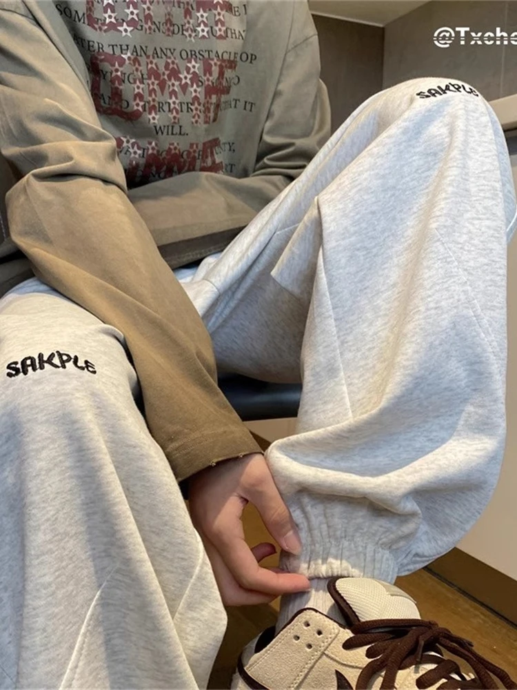 

Мужские спортивные брюки с цветочной вышивкой, весенне-осенние, свободного кроя, в американском стиле, модные повседневные брюки от трендового бренда