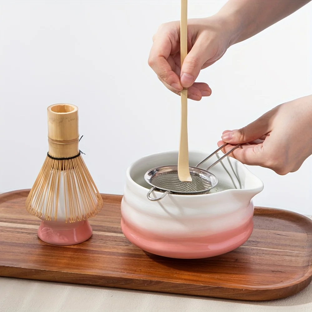 

5pcs gradient pink ceramic matcha set, including a matcha bowl, a matcha egg beater, a stand, a bamboo spoon and a sieve