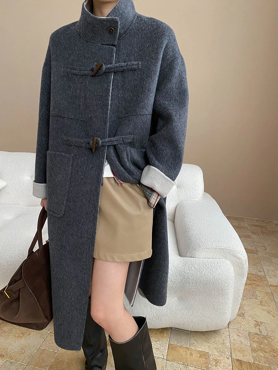 معطف صوف على الوجهين مزدوج الصدر مع طية صدر مدببة وأزرار قرن بلونين كتلة ألوان للرجال معطف كلاسيكي مصمم حسب الطلب